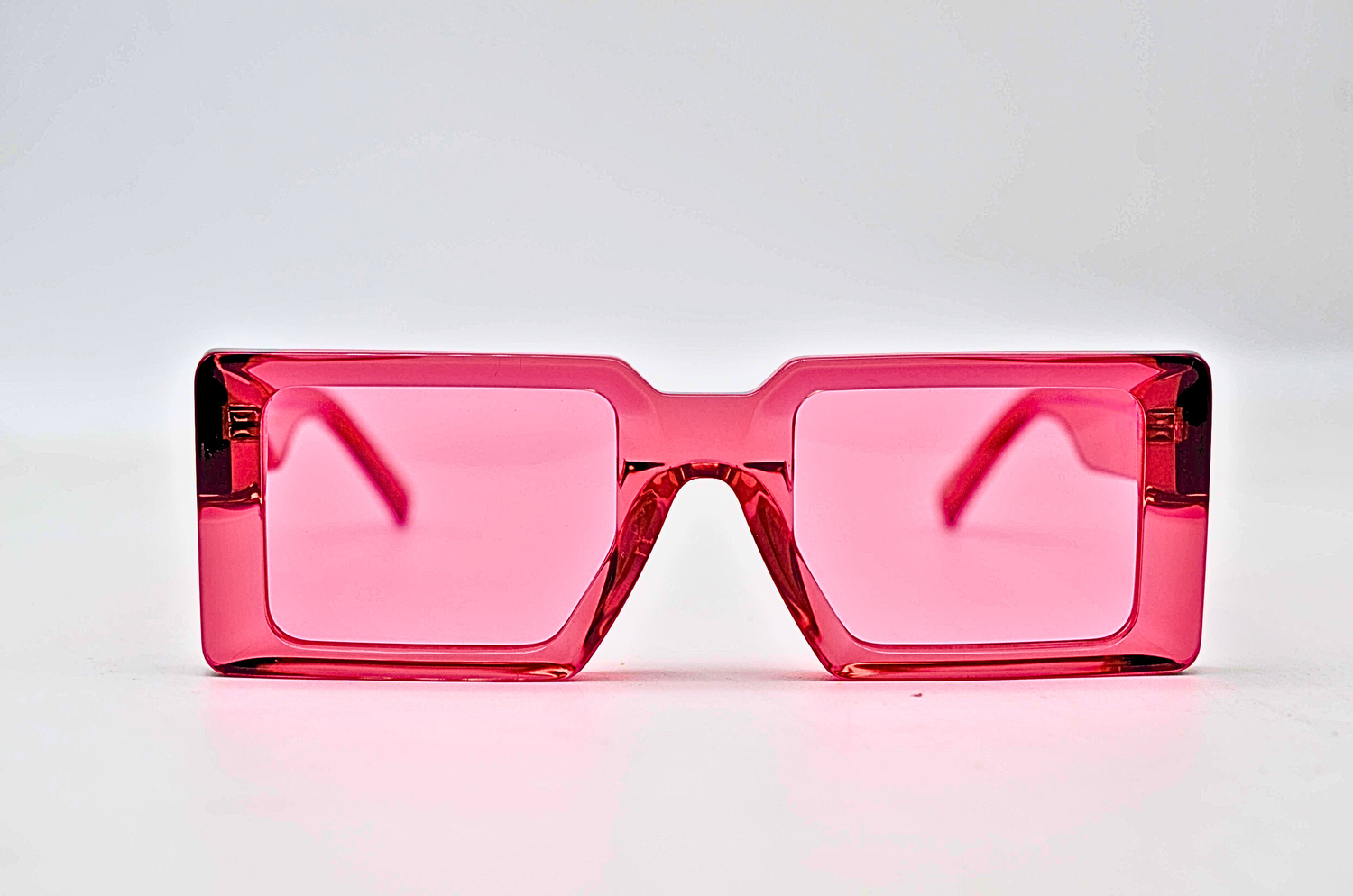 crimson red , elongated square talian acetate sunglasses with UVA UVB 400 red lens.